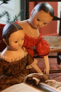 Charlcie gets her first look at the article about her and her sisters in Prims Winter 2013, while Savannah peeks over her shoulder.