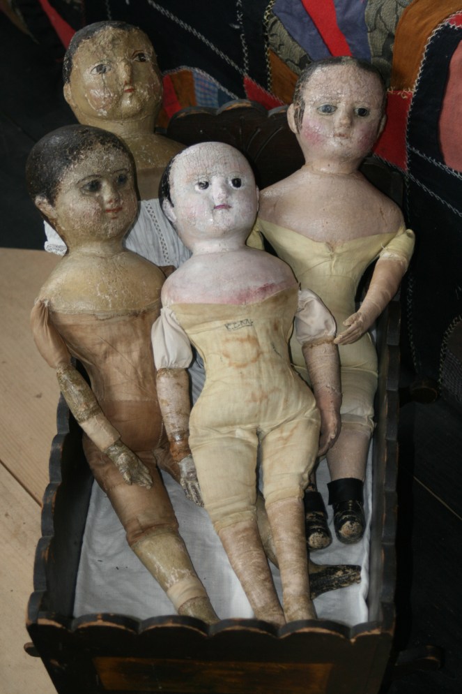 Here is a treat that I don't often get to see!  Four antique Izzies all tucked up together in an antique cradle!