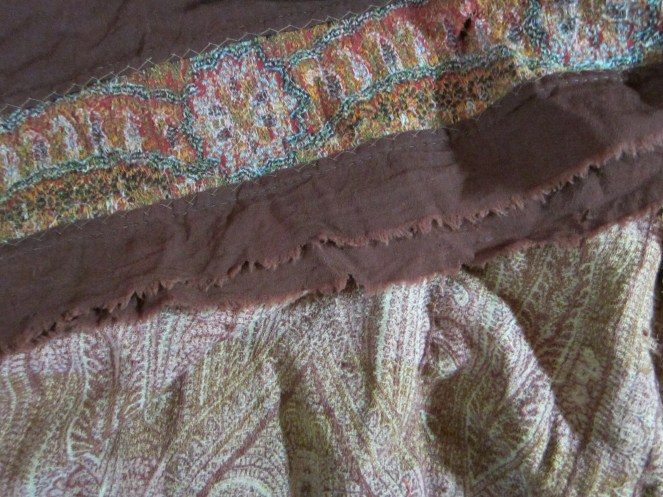 Well worn antique wool shawls, destined to become doll clothing for a special doll.