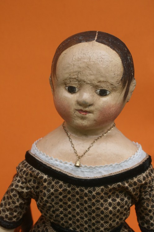 Anna's black dress is made from another very early cotton print fabric.  The neckline of the dress is trimmed with antique ivory cotton ribbon, plus a row of antique silk velvet ribbon.  Her chemise is trimmed in tiny waved braid (aka rick rack in modern terms).