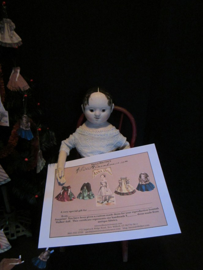 My gift certificates feature images of antique paper dolls that have been altered.  Illustrations of my Izannah Walker reproduction dolls now replace the original paper doll heads.