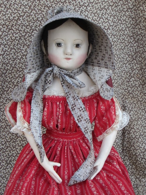 The bright late afternoon sunlight was making the light behave quite rambunctiously while I was taking these photos, so this young lady's sister loaned her a bonnet to protect her fair complexion. 