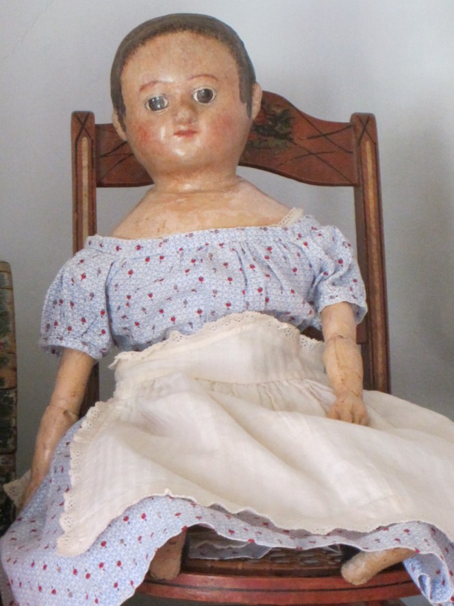 A charming 18 inch Izannah Walker doll.