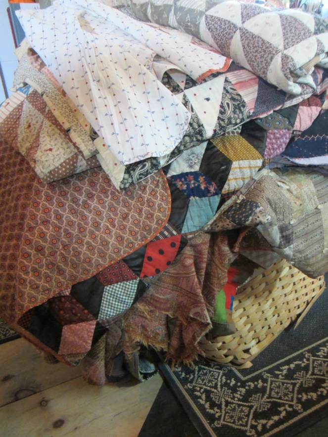 I'm feeling a bit like the princess and the pea with this new waist high stack of antique quilts in my studio!