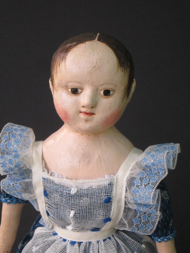 Mary found the antique lace to trim this pinafore.  If you look closely you can see the pattern of tiny blue stars in the lace.