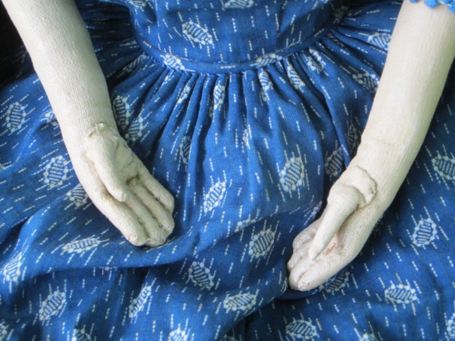 I cartridge pleated the skirt of this dress.  Mary requested thumbs that are folded close to the palms of the hands. 