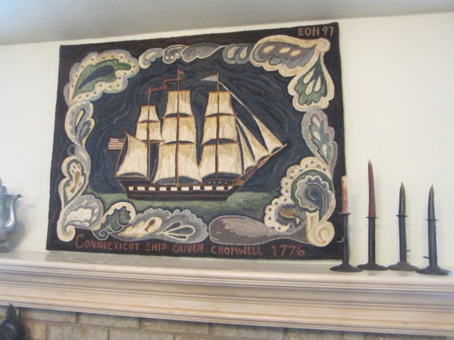 This outstanding rug hangs over the mantle in Edyth's living room.