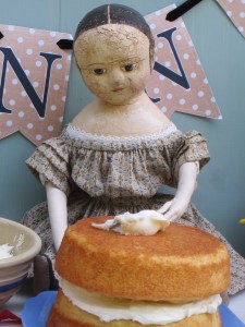 Izzybelle behaved herself long enough for this photo to be taken, but immediately afterwards, when no one was looking, she managed to gobble down enough frosting to make herself sick & managed to smear it everywhere!!!  Even behind her ears!