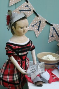 Poor Andrew!  He couldn't get any of the girl's to wear the hats he made for the party!  The older dolls all said it was because they didn't want to mess up their hair... but little Izzybelle was heard to say it was because he didn't put a fancy cockade on any hat other than his own!