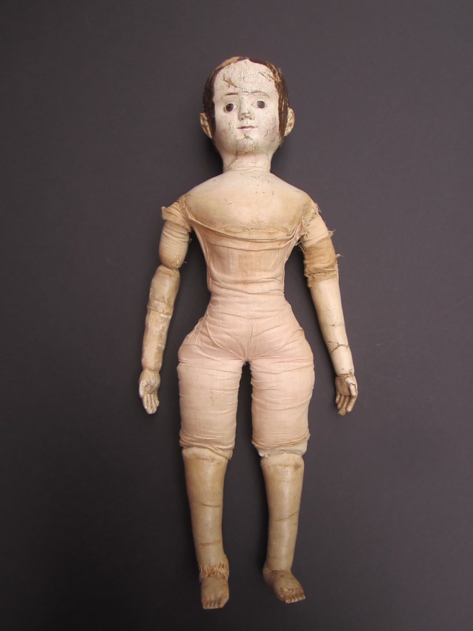 The doll's linen second skin also needed repairs and a newly made replacement arm was itself in need of replacement.