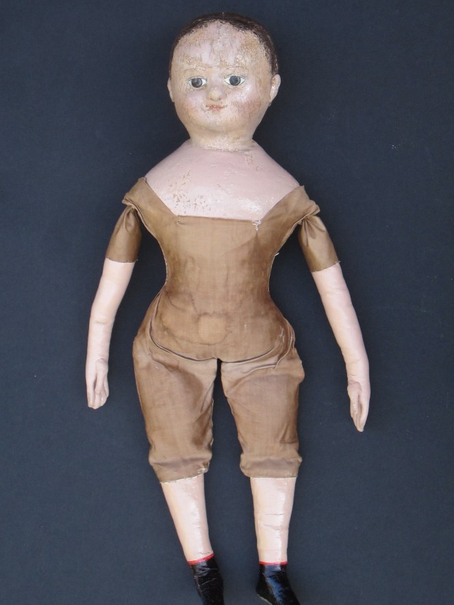 These photos were taken before the restored doll was shown to her owner.  After she got a chance to see the doll, we decided to add additional aging to the new arms.  I always like to consult with owners through out the restoration process to make sure that the cosmetic part of the restoration looks the way they want it to.