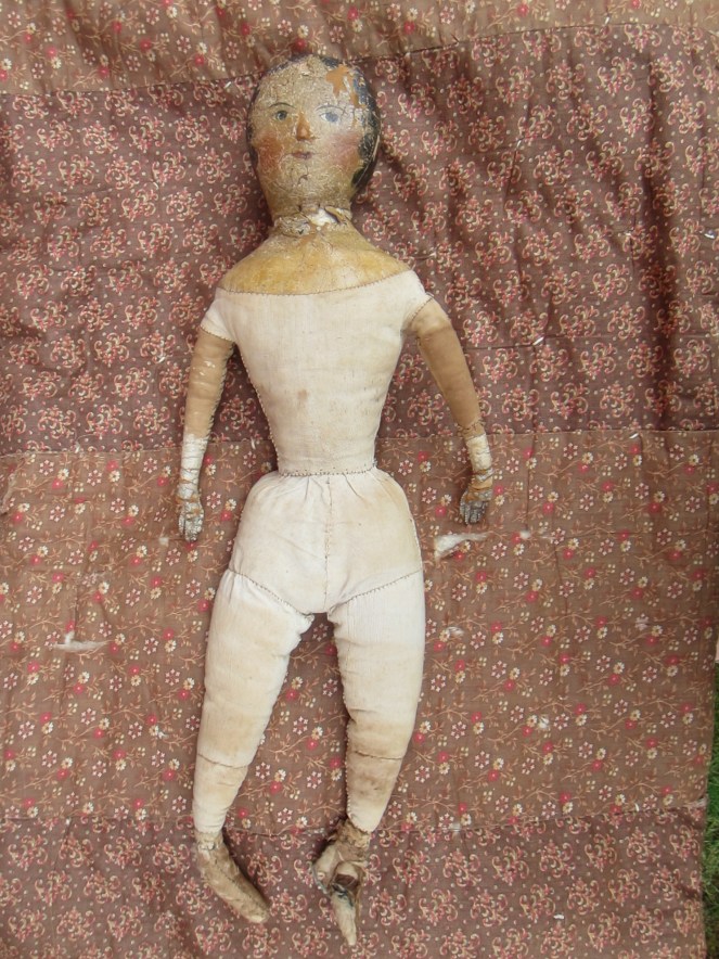 This is how the doll looks after I did a bit of repair to her neck and ankles.