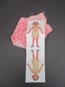 I love this antique pink fabric with this little fabric version of one of my antique Dennison paper dolls. After sewing and stuffing her, dress her in crepe paper frills like the originals.