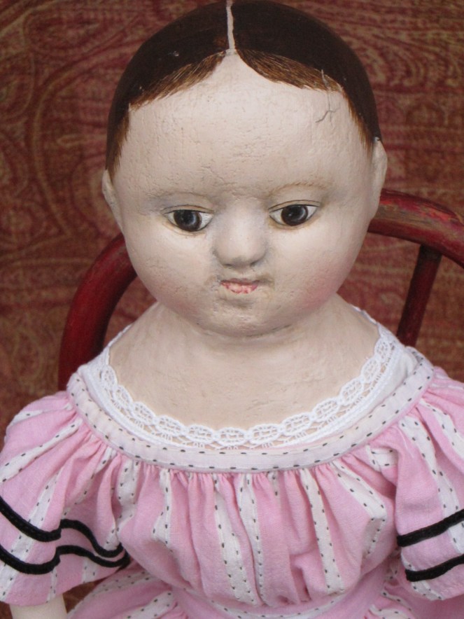 Suzanne's doll has a wardrobe of four dresses, so that she can dress for any occasion!  Not shown are her warm winter wool petticoat and summer sunbonnet.