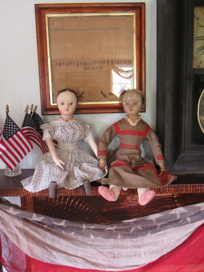 The original Ismay, on the right, is a very early example of one of Izannah Walker's dolls.  My reproduction custom ordered Ismay on the left is a faithful recreation of the original, with custom details specified by her new owner.