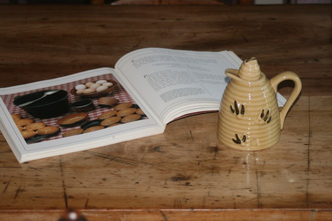 "Isabeau will you find the page with the honey cake while I get out the honey pitcher?"