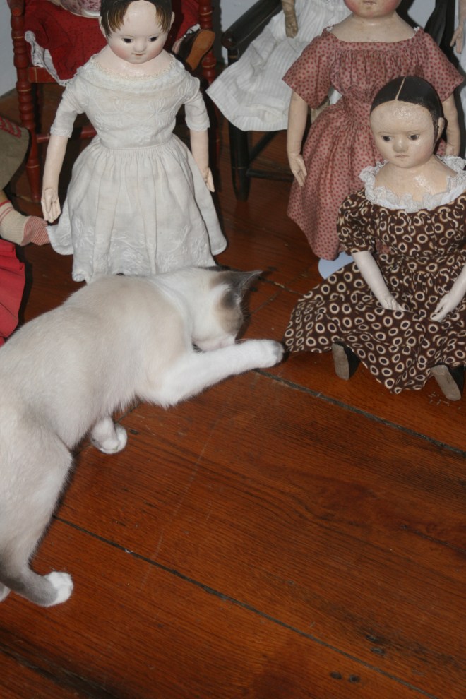Jack very much wants to play with Billie's doll, who is another one of our party guests.
