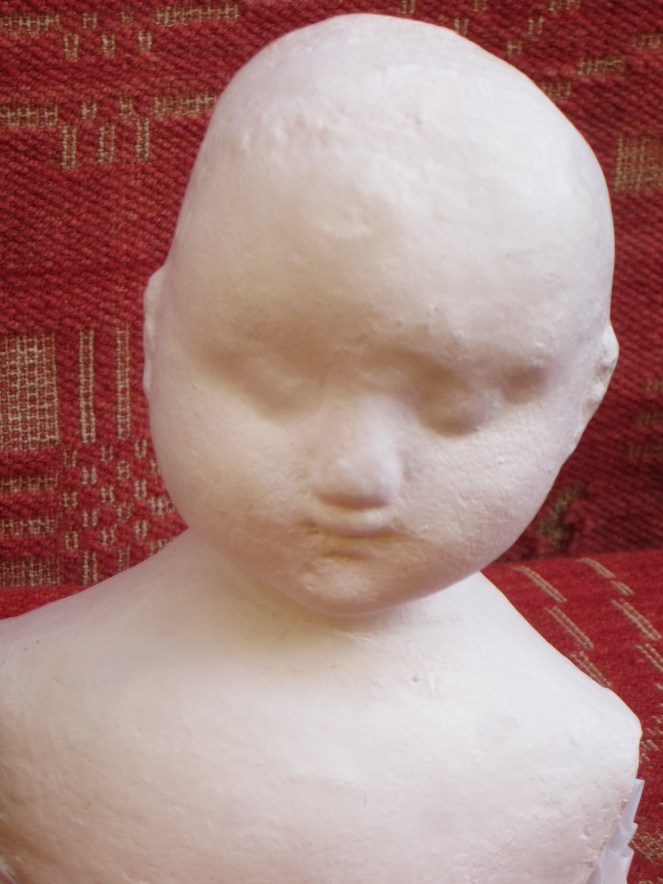 Notice all of the paint texture of the original antique doll is captured in this composition head.